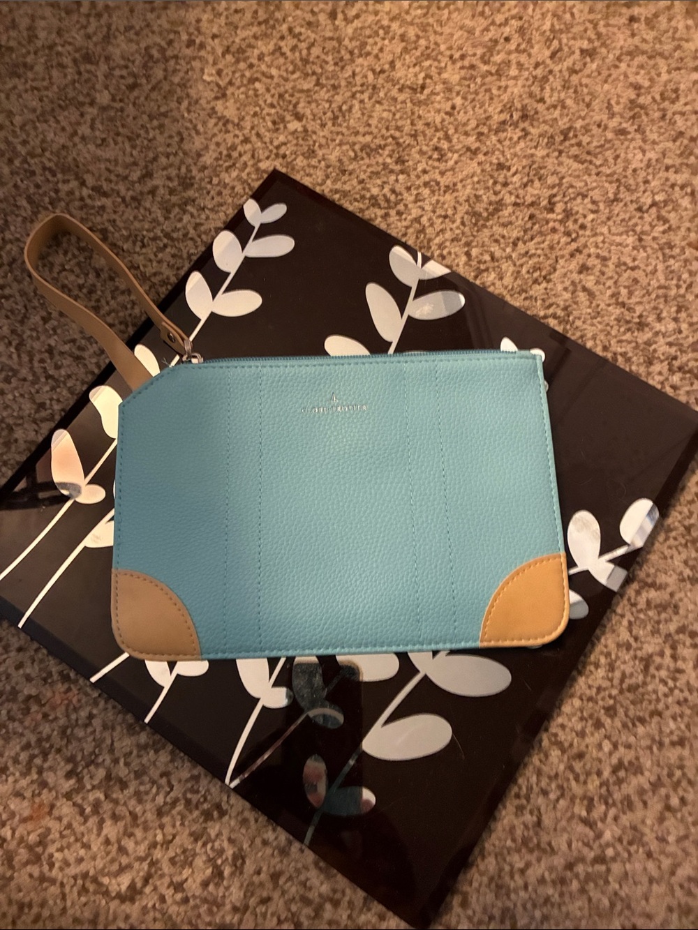 Light Blue Pebbled Wristlet Clutch with Tan Accents by Globe Trotter